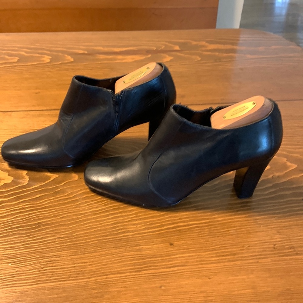 Leather bootie…side zipper.  3” wooden heel
